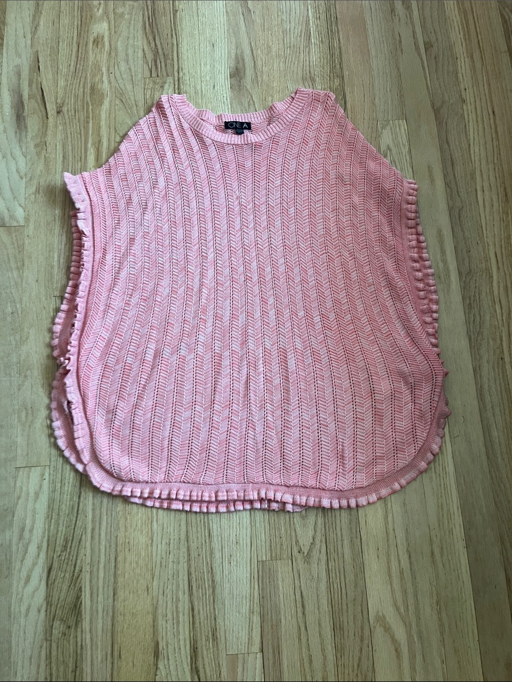Pink chevron style knit poncho sweater